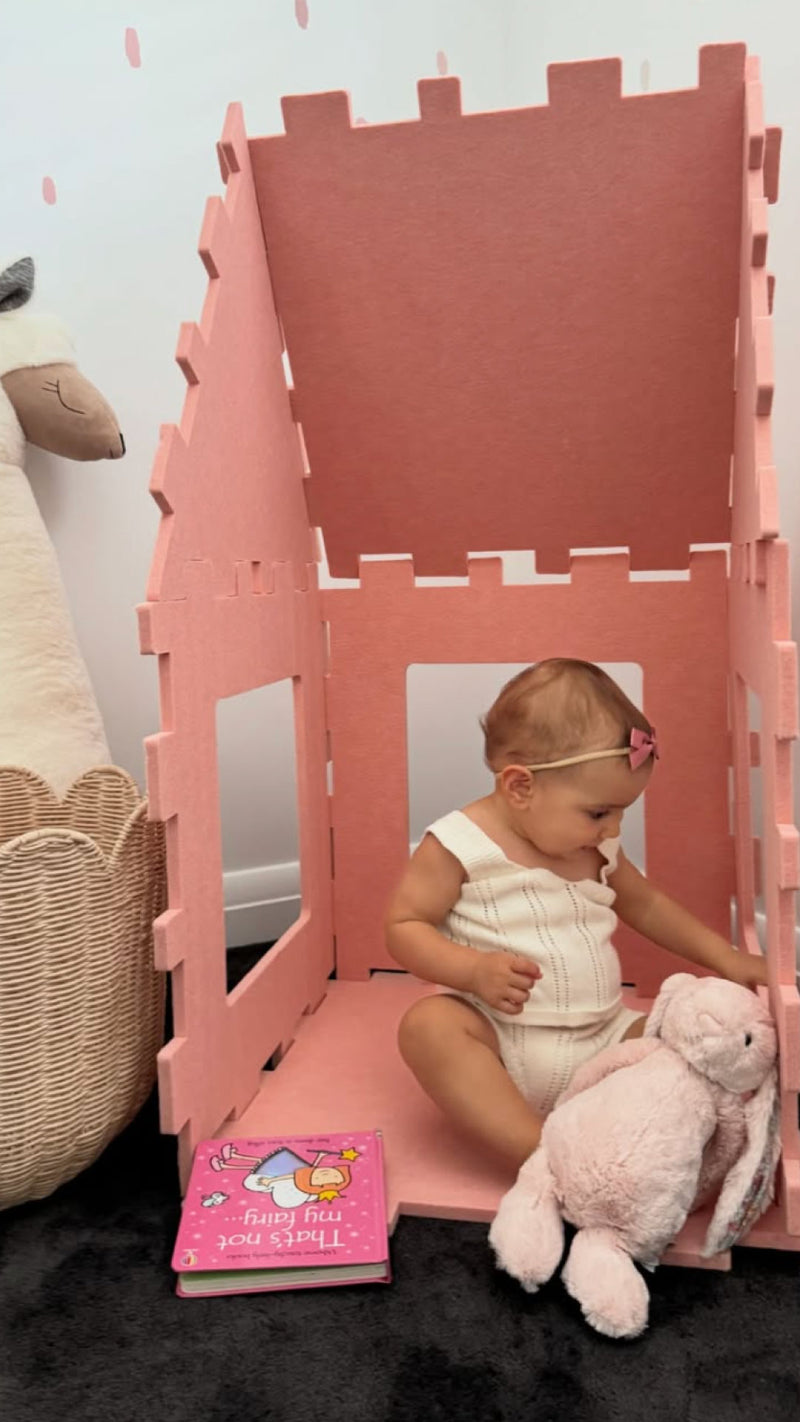 Child building a fort independently