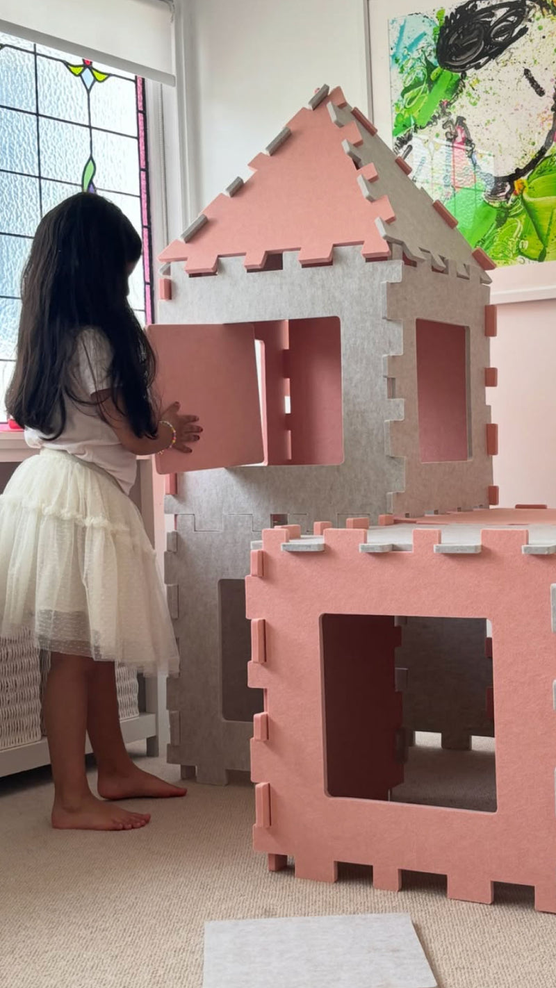 Kids playing inside a fort