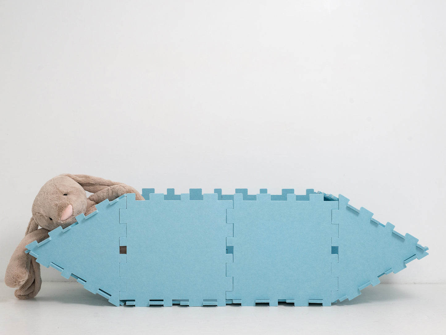 Sky Blue Fuzzy Fort Build as a boat for little kids to climb in made from Eco felf the perfect eco friendly toy for kids